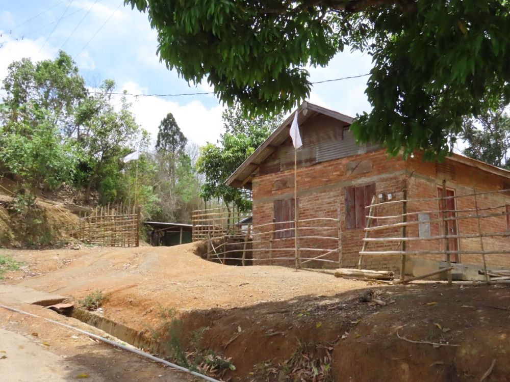 White flags are seen hoisted above houses in H Wajang village in Chandel district of Manipur in this photos provided the PRO Defence. The flag, among others, symbolises ‘reassurance, peace, and harmony, maintains the PRO.